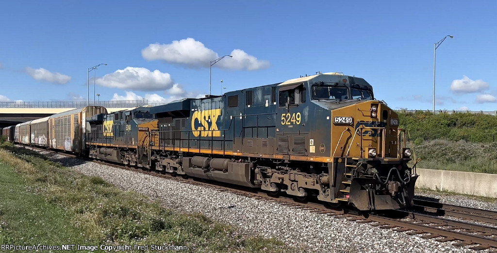 CSX 5249 leads M214.